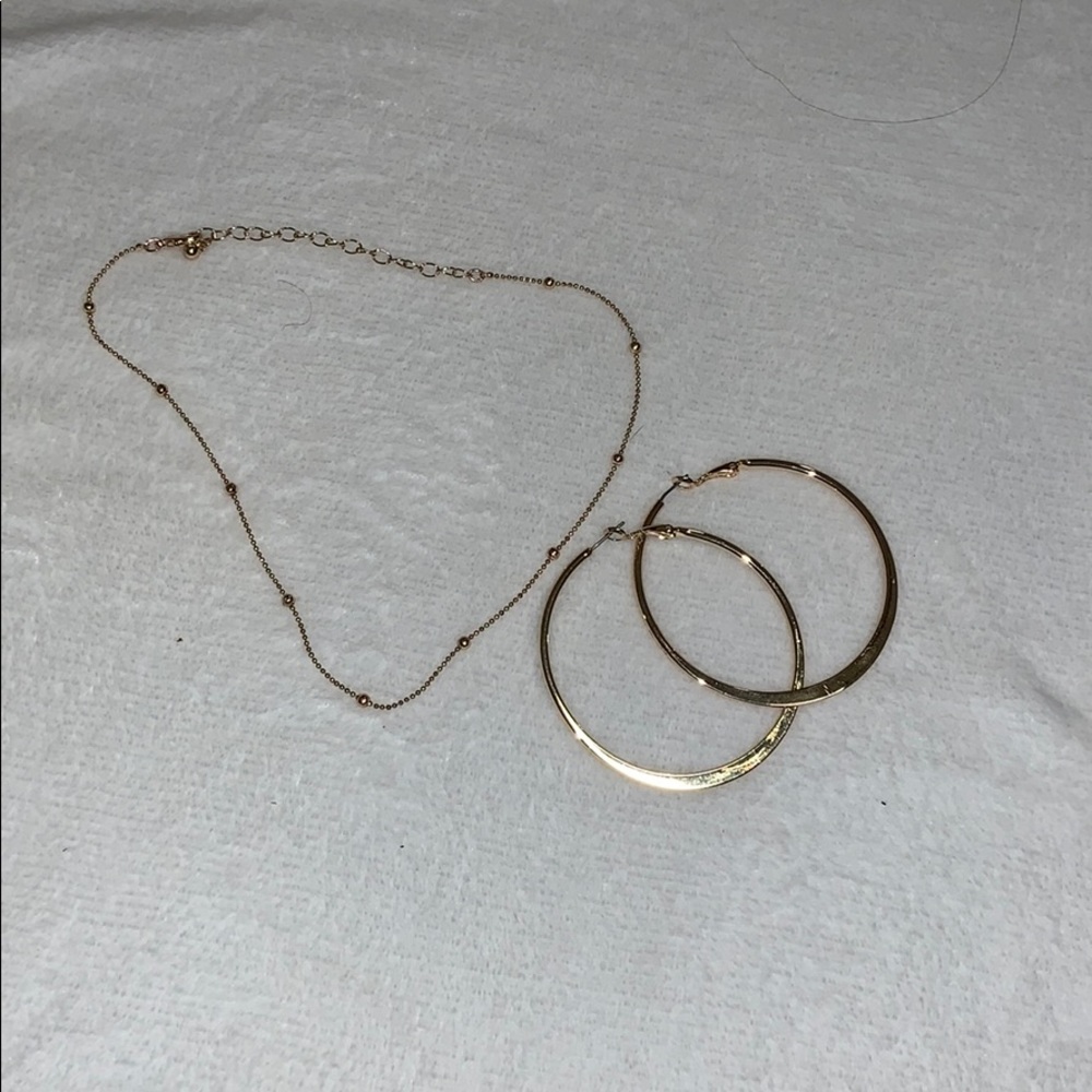 hoop earring & a necklace